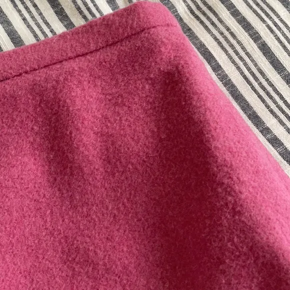 Beautiful BCBGMAXAZRIA pink wool blend midi skirt with fringe detail