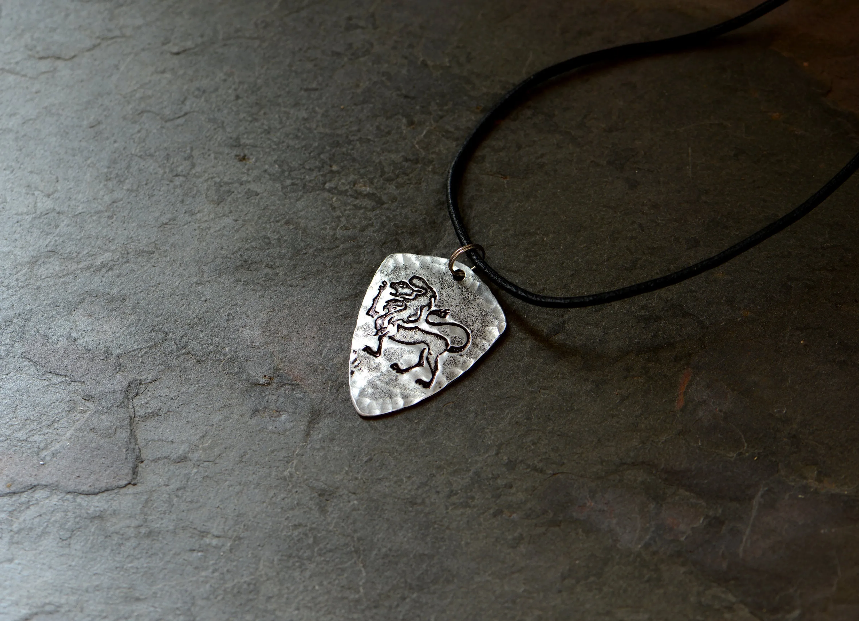 Sterling silver Leo Zodiac shield shaped necklace with rustic finish