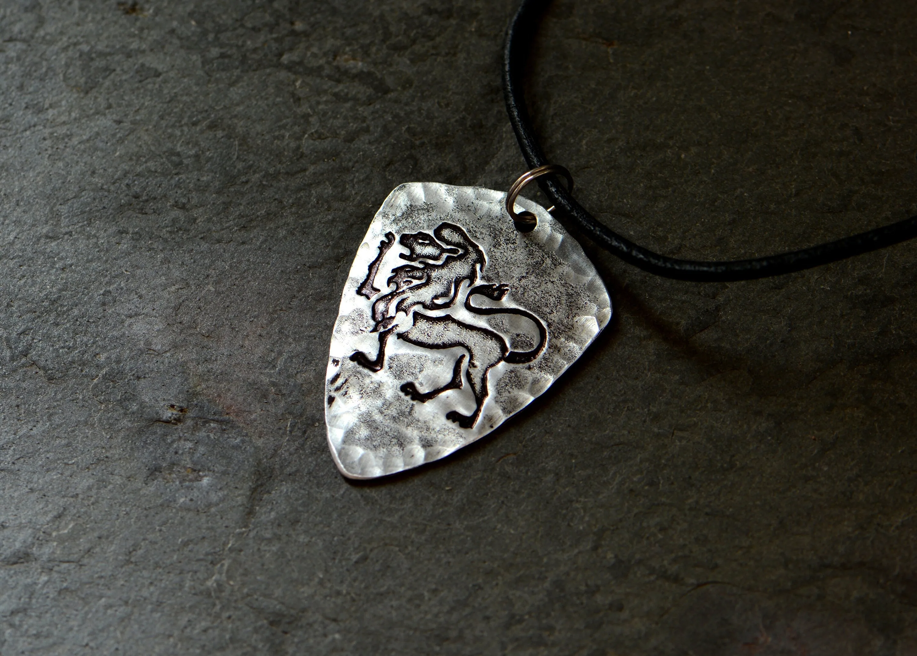Sterling silver Leo Zodiac shield shaped necklace with rustic finish