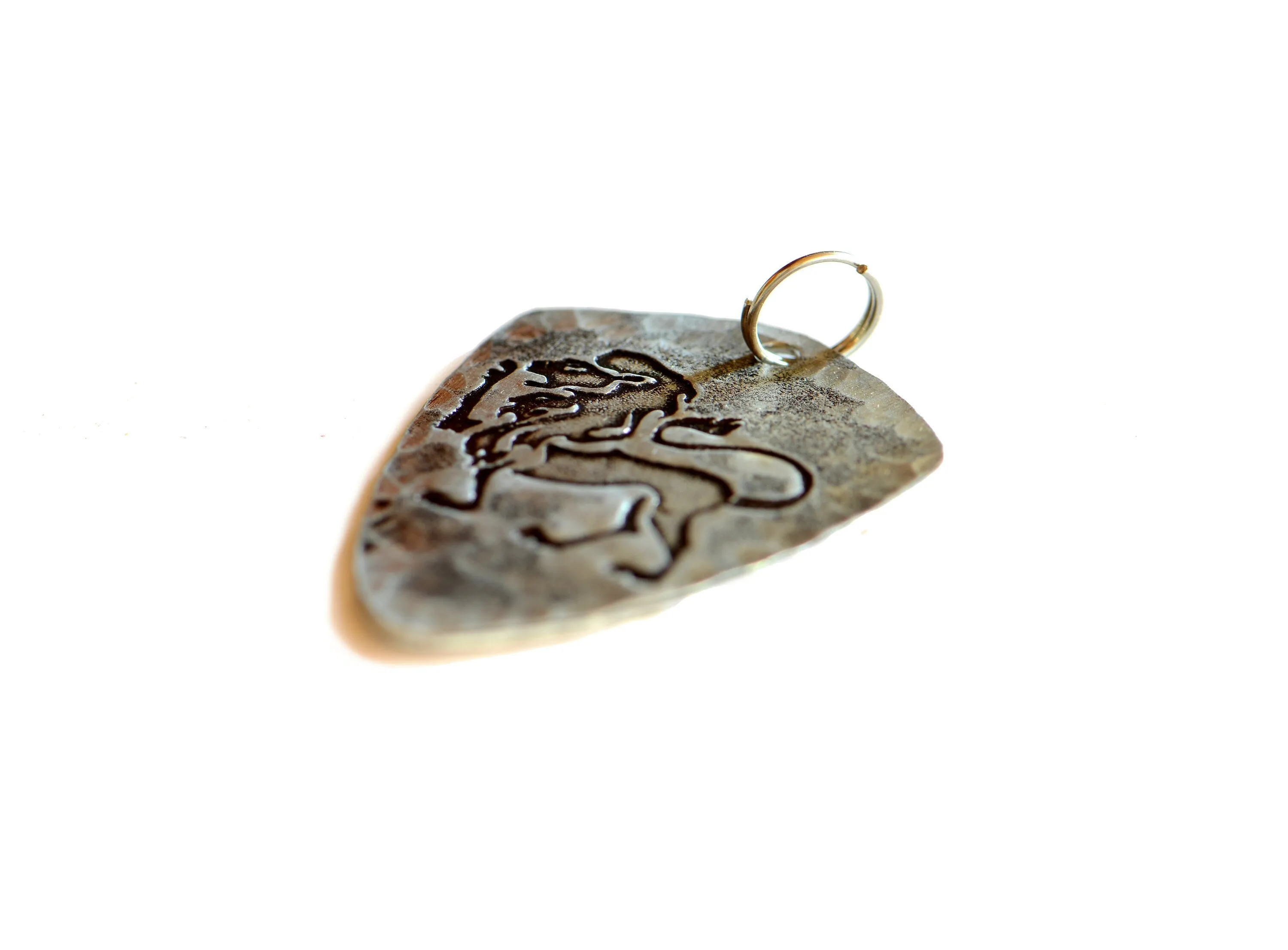 Sterling silver Leo Zodiac shield shaped necklace with rustic finish