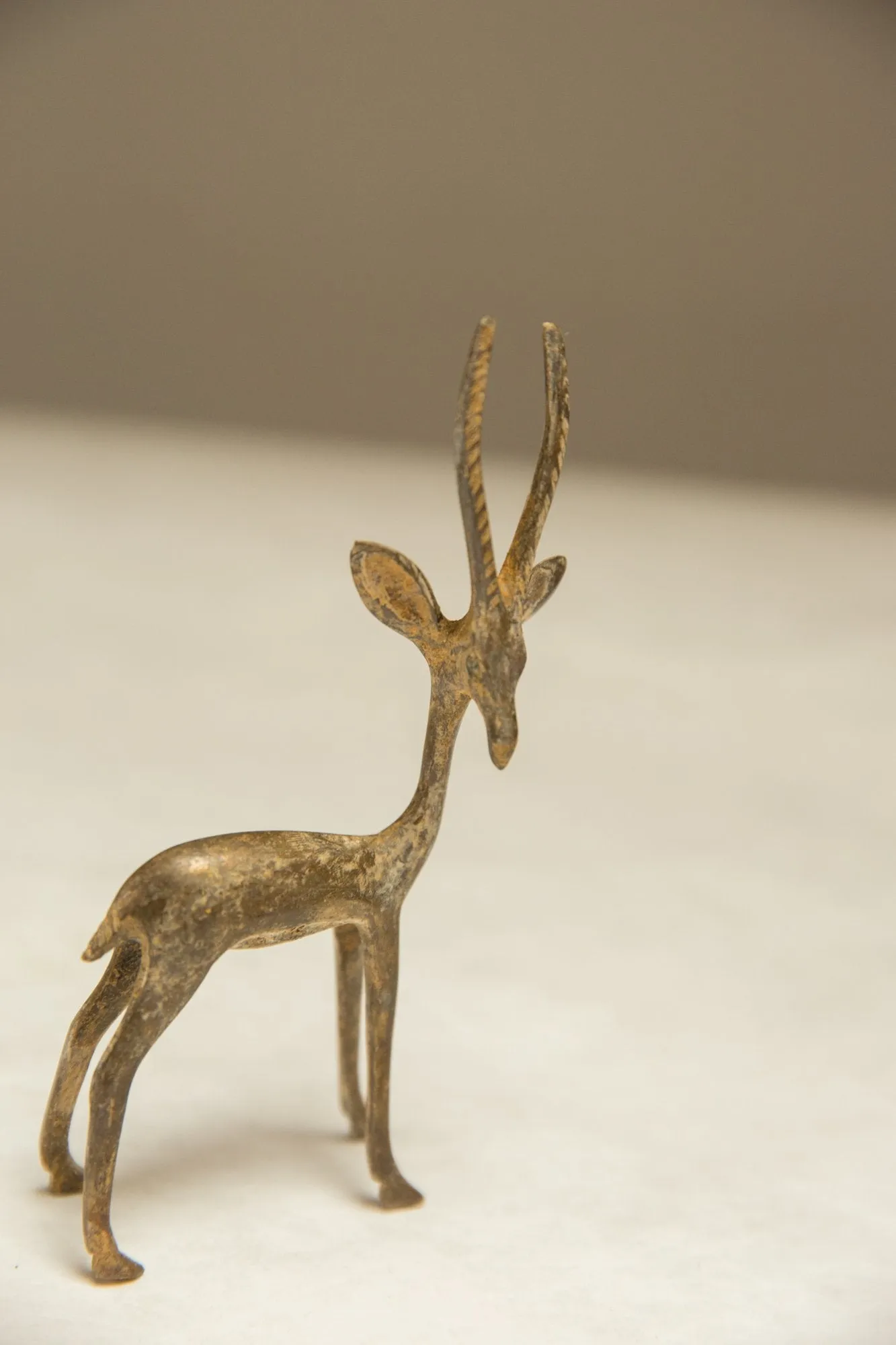 Vintage African Light Patina Turning Gazelle