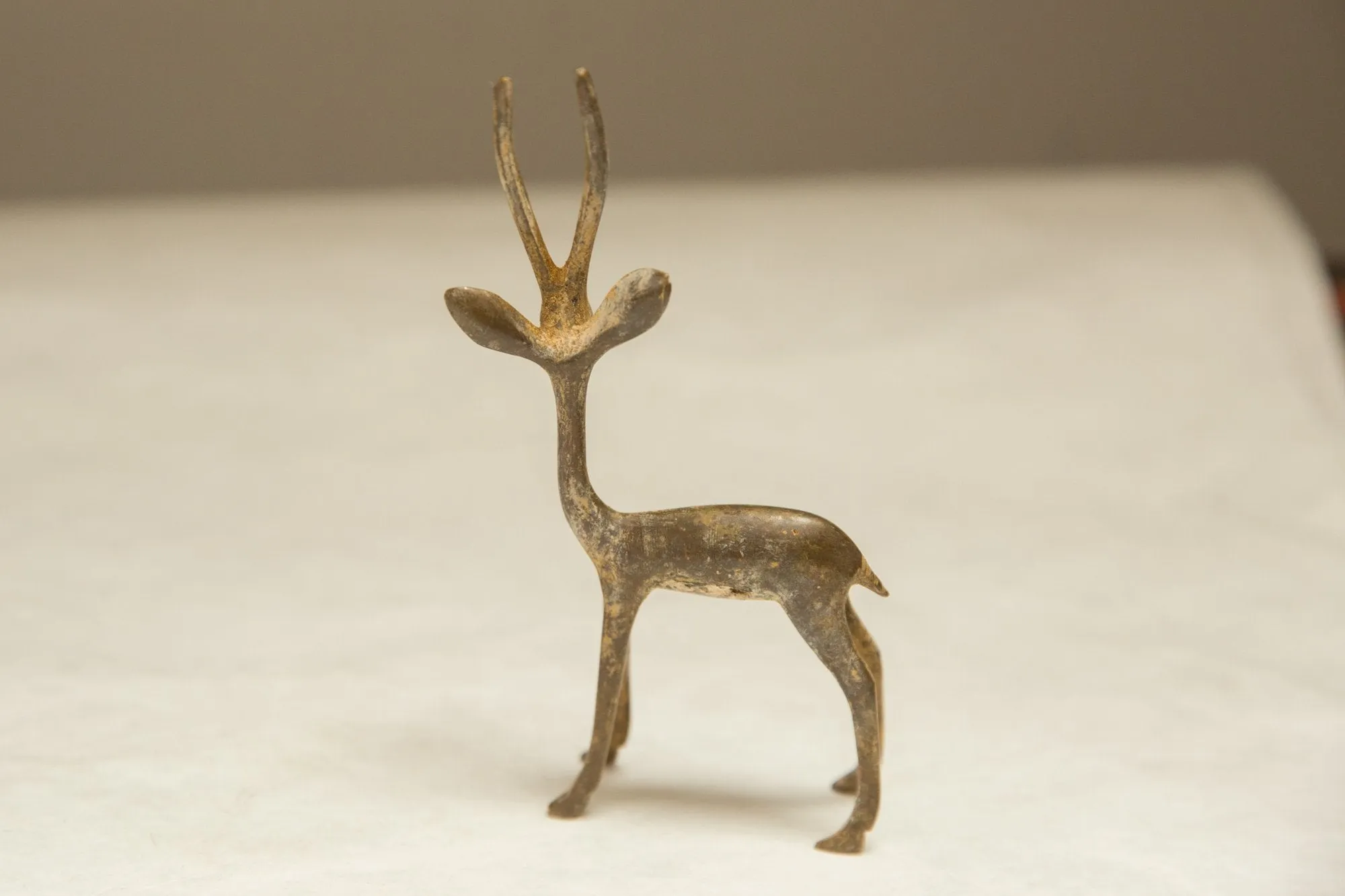 Vintage African Light Patina Turning Gazelle